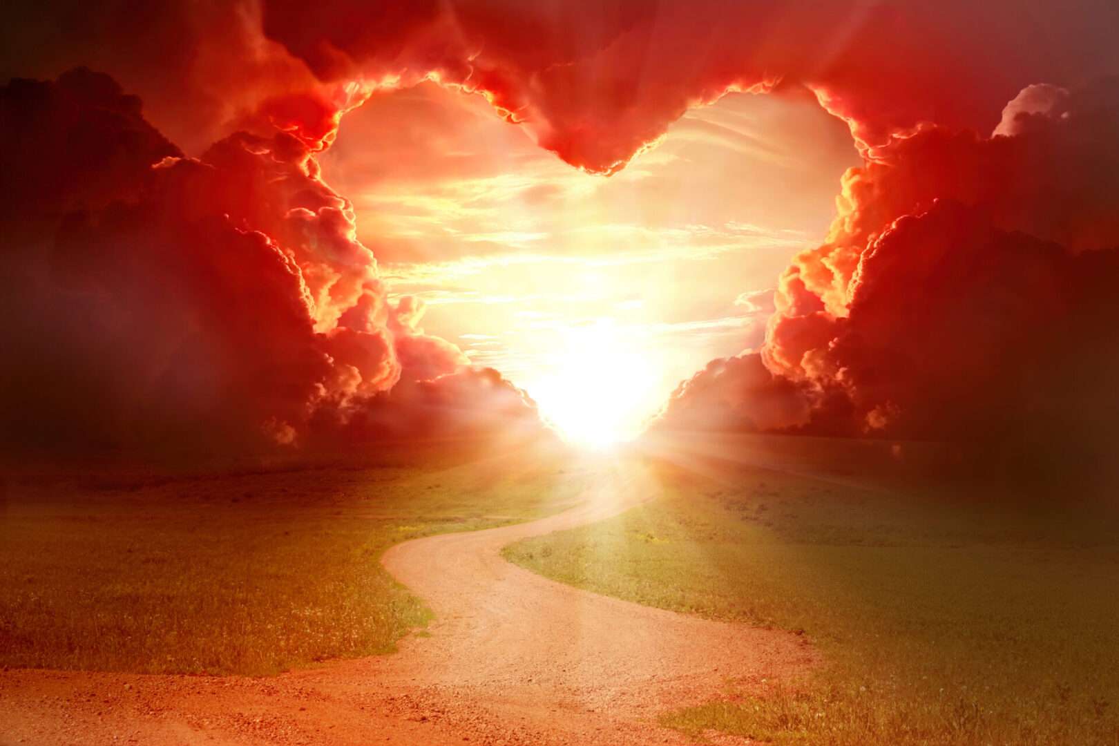 A red heart shaped sky at sunset.
